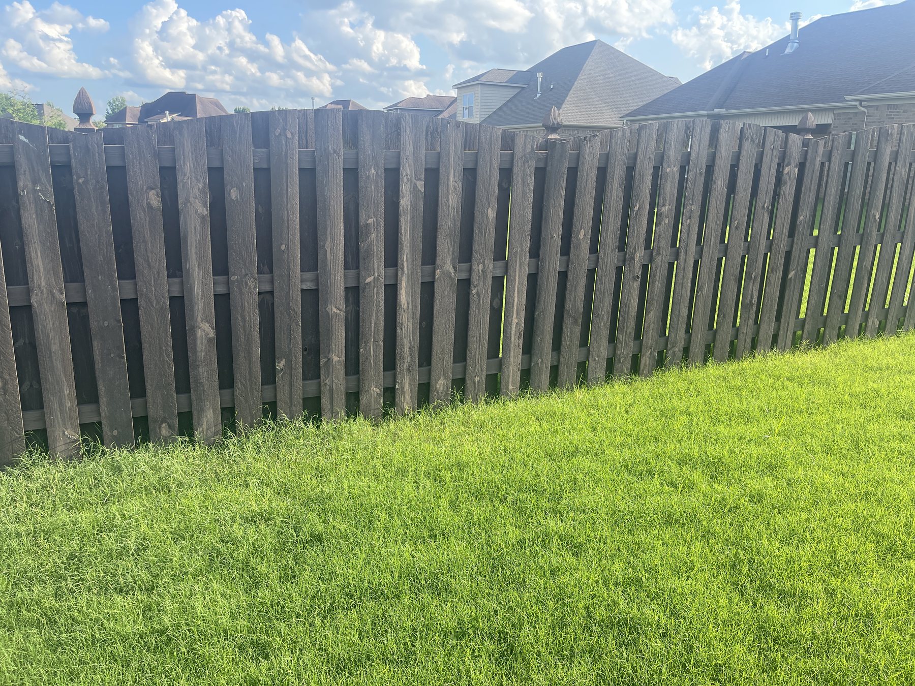 Long wood privacy fence repaired by Only Solutions